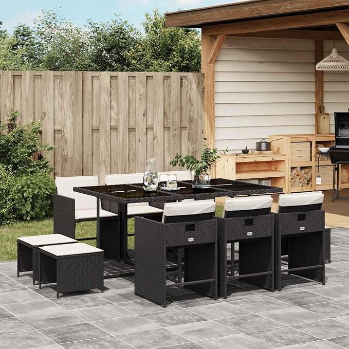 11-Piece Black PE Rattan Patio Dining Set with Cushions | Includes 10 chairs and a tempered glass table, providing spacious outdoor seating for family dining and gatherings.