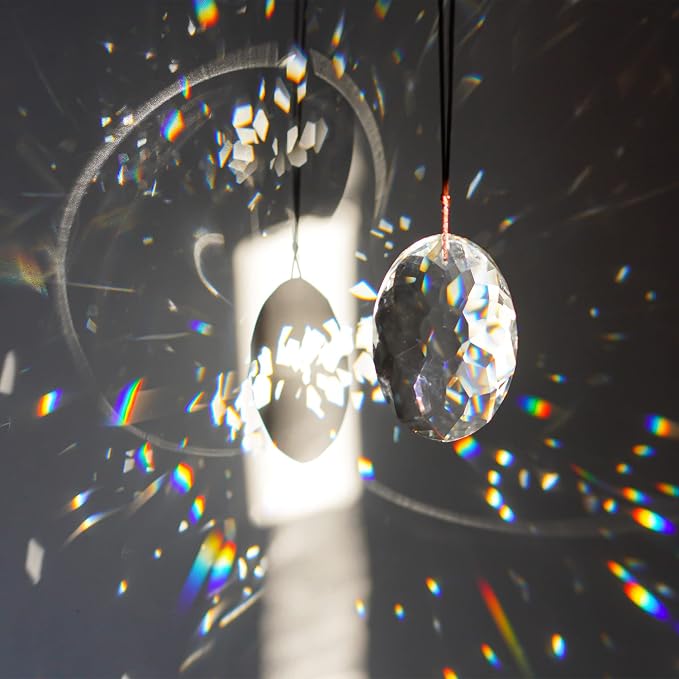 YU FENG 3.5 Inch Oval Crystal Prism Suncatcher, Clear Rainbow Maker | Clear Faceted Crystal Design, Window Hanging Pendant, Sun Catcher Ornament, Natural Light Reflection, Indoor Outdoor Decor