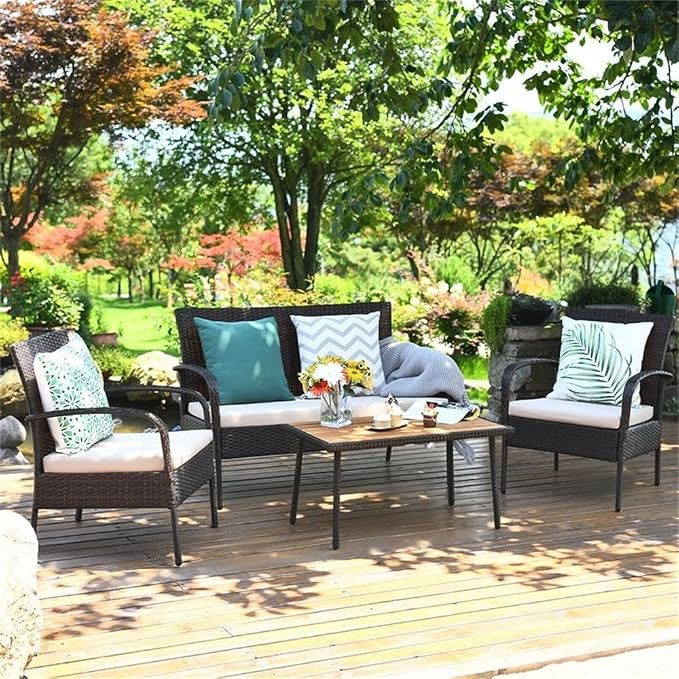 Pemberly Row 4-Piece Patio Rattan Furniture Conversation Set, Brown PE Wicker and Steel Frame, Acacia Wood Table, Ergonomic Design with Cushions, Indoor or Outdoor Seating for Garden or Patio Use