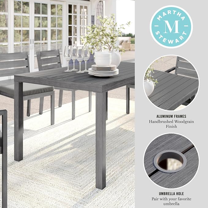 Martha Stewart Bedford 62" Indoor-Outdoor Aluminum Patio Table with Umbrella Hole and Brushed Woodgrain Finish in Gray