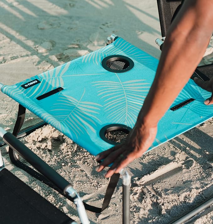 Neso Beach Table - Lightweight, Portable and Foldable Table for Beach, Camping and Outdoor Adventures - Stable Surface - with Cup Holder for Drinks and Phone Pockets - Aqua Fronds