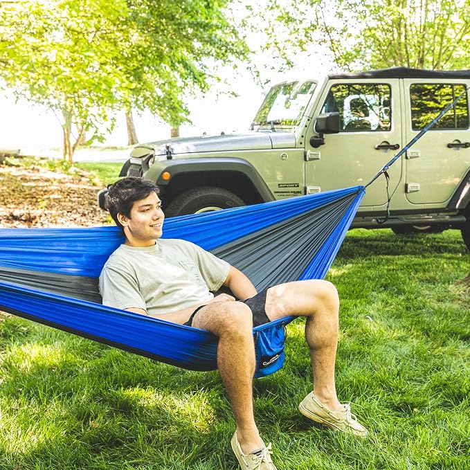 Hammock in a Bottle By Castaway Living, Blue/Black Double Camping Hammock with 2 Tree Straps, 32 oz. Bottle, Triple Stitched Durable Nylon Material, Compact Design for Travel, Backyard, 400 Lbs.