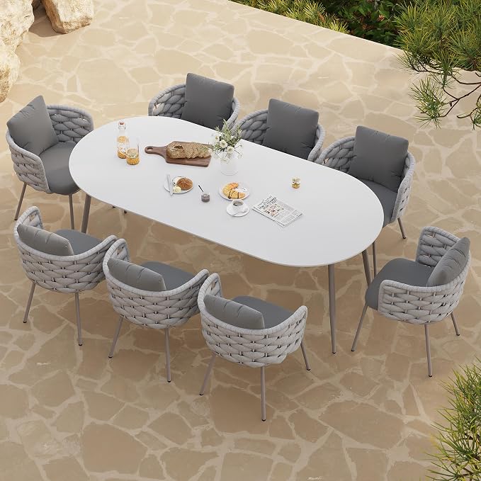 9-Piece Outdoor Dining Set with 84'' Oval Sintered Stone Top, Rope Woven Armchairs, Aluminum Frame, Cushions for Patio and Garden Dining